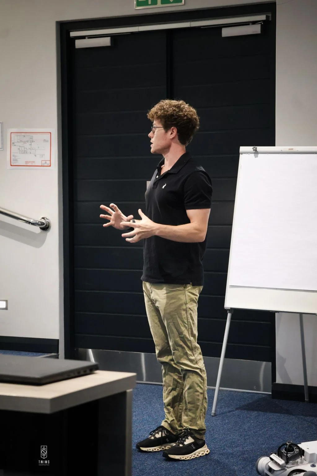 A teaching session beside a flip chart at TWIMS